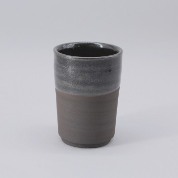 Black stoneware coffee cup.